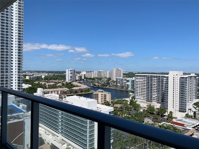 balcony featuring a water view