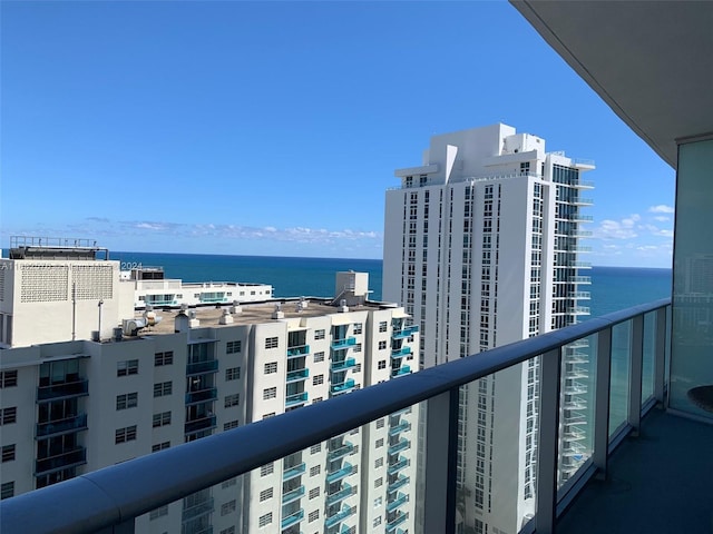 balcony featuring a water view