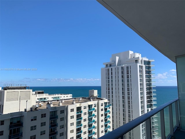 balcony featuring a water view