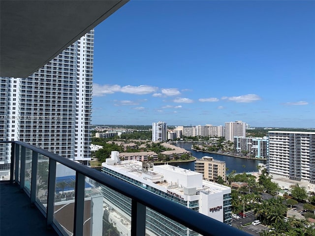 balcony featuring a water view