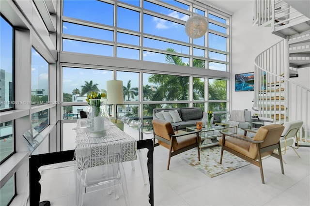 sunroom / solarium featuring a healthy amount of sunlight