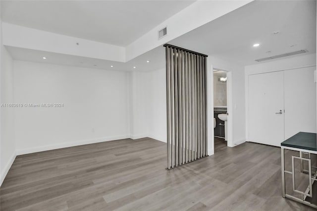 empty room featuring hardwood / wood-style floors