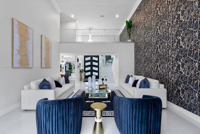 2440 SW 105th Ter, Davie, FL 33324 - living area with an accent wall, recessed lighting, and ornamental molding