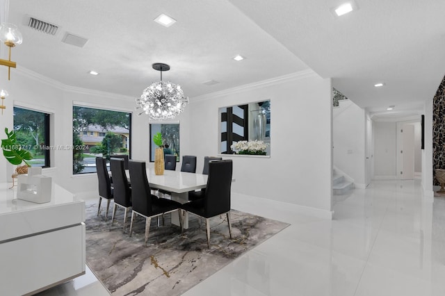 dining space with crown molding, a textured ceiling, and a chandelier