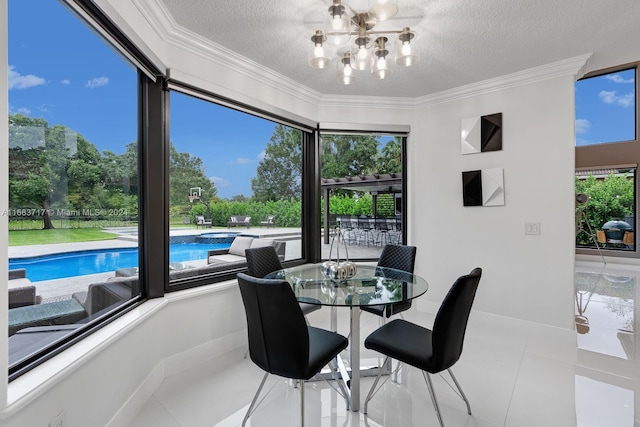 2440 SW 105th Ter, Davie, FL 33324 - tiled dining area featuring a chandelier, a textured ceiling, and ornamental molding