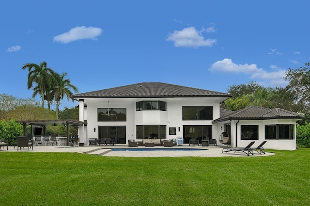 2440 SW 105th Ter, Davie, FL 33324 - back of house with a tile roof, a yard, a patio area, and stucco siding