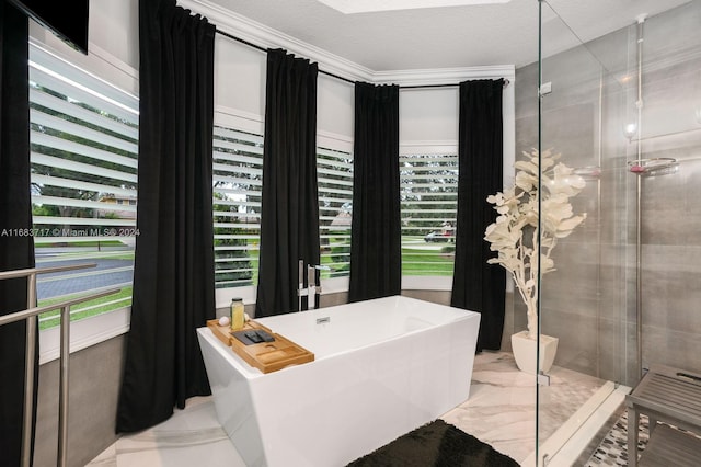 2440 SW 105th Ter, Davie, FL 33324 - bathroom featuring marble finish floors, a shower stall, a freestanding tub, and plenty of natural light