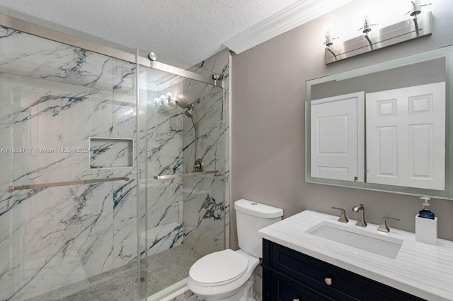 bathroom featuring vanity, ornamental molding, toilet, and an enclosed shower