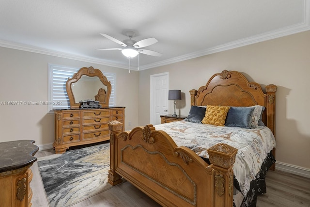 2440 SW 105th Ter, Davie, FL 33324 - bedroom featuring crown molding, wood finished floors, and ceiling fan