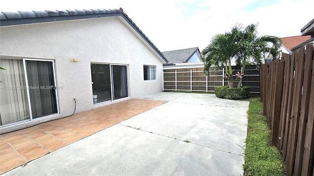 view of patio with fence