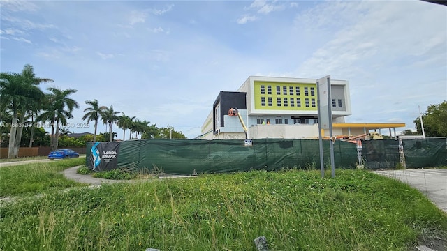 view of property's community with fence