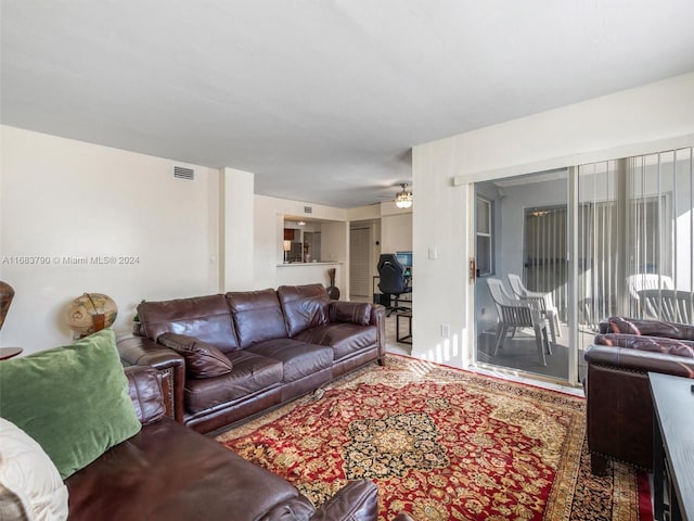 living room featuring ceiling fan