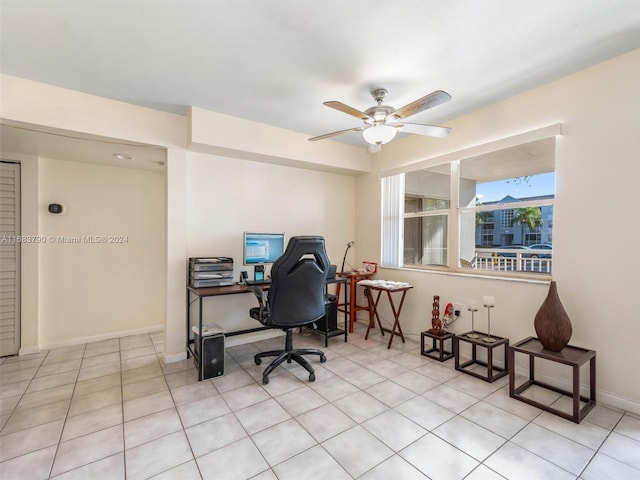 office area featuring ceiling fan and light tile patterned flooring