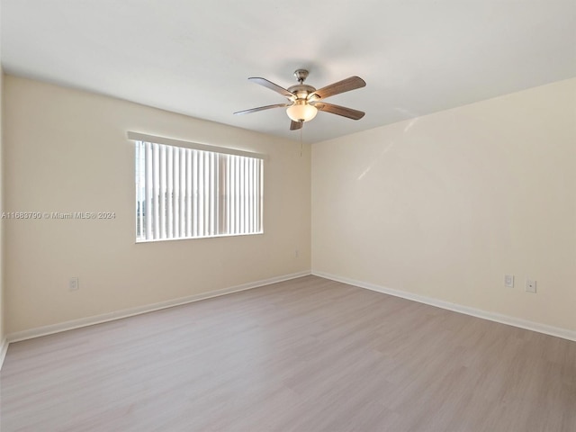 unfurnished room featuring light hardwood / wood-style flooring and ceiling fan