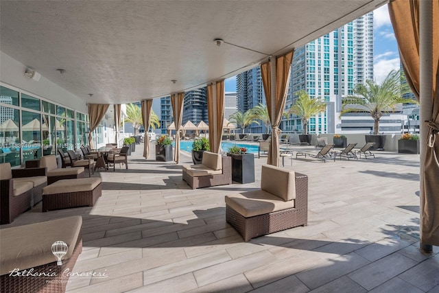 view of patio / terrace with a community pool