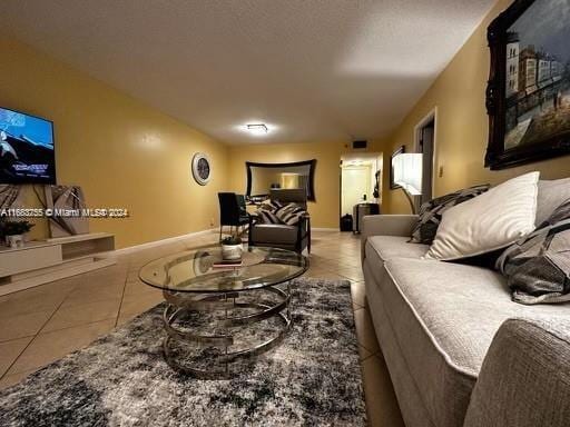 living room with light tile patterned floors