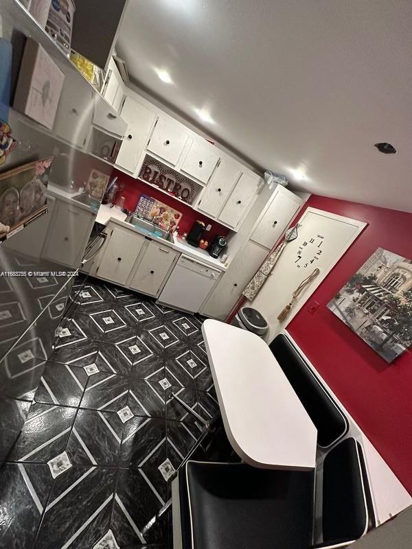 kitchen with white cabinets