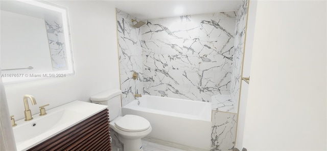 full bathroom featuring vanity, toilet, and tiled shower / bath