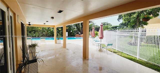 view of swimming pool featuring a patio