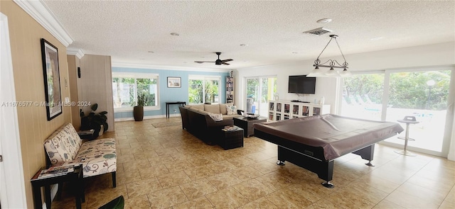 game room featuring crown molding, a textured ceiling, billiards, and ceiling fan