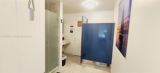 bathroom with tile patterned flooring