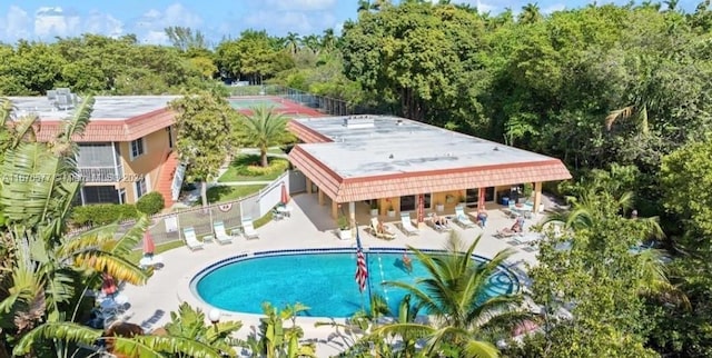 view of swimming pool with a patio