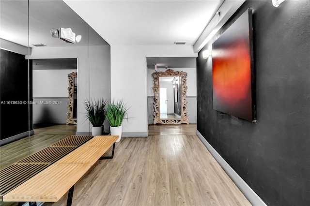 corridor featuring light wood-type flooring