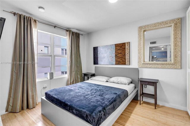 1512 Washington Ave Unit 106, Miami Beach, FL 33139 - bedroom featuring wood finished floors