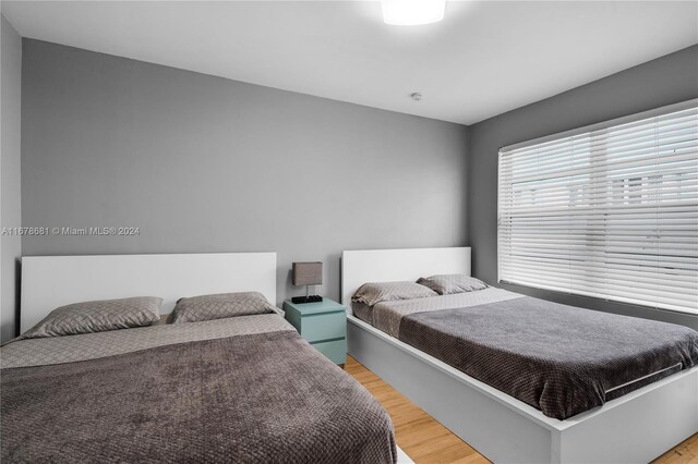 1512 Washington Ave Unit 203, Miami Beach, FL 33139 - bedroom with light wood-type flooring