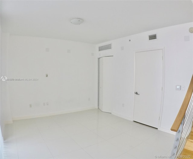 unfurnished bedroom with a closet