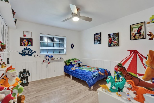 bedroom featuring light hardwood / wood-style flooring and ceiling fan