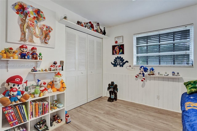 interior space featuring a closet and light wood-type flooring