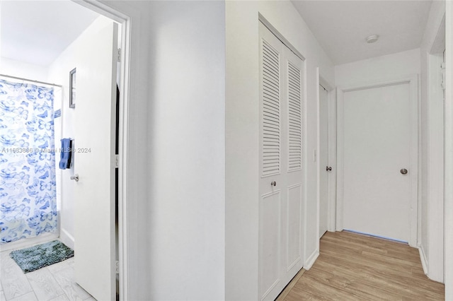 hall featuring light hardwood / wood-style flooring