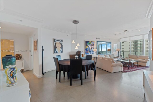 dining room with crown molding