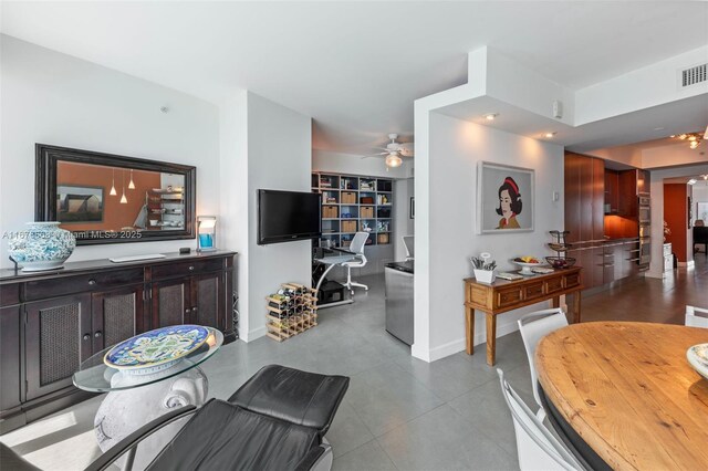 living room featuring ceiling fan