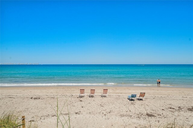 property view of water featuring a view of the beach