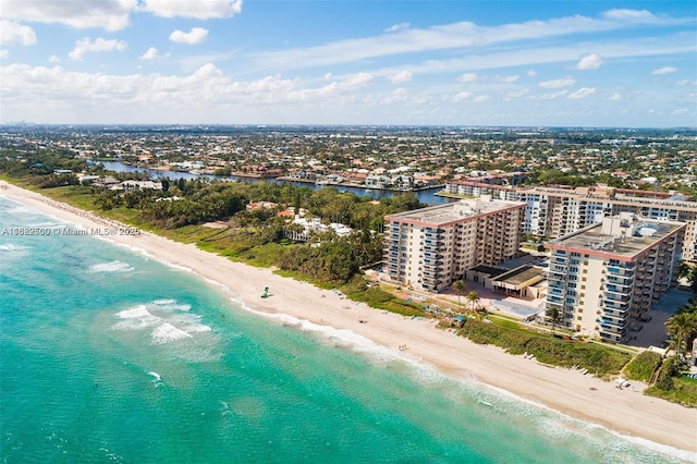 aerial view featuring a water view and a view of the beach