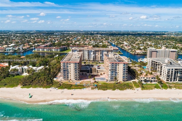 aerial view featuring a beach view and a water view