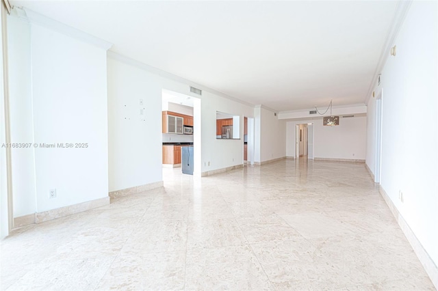 unfurnished room featuring ornamental molding