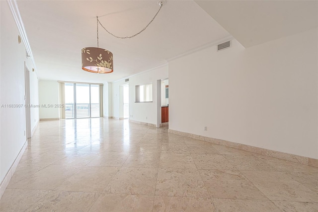 unfurnished room featuring floor to ceiling windows and ornamental molding