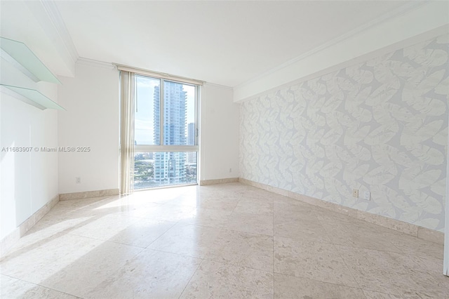 unfurnished room featuring ornamental molding