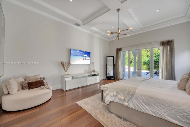 bedroom with coffered ceiling, access to outside, hardwood / wood-style floors, crown molding, and a notable chandelier