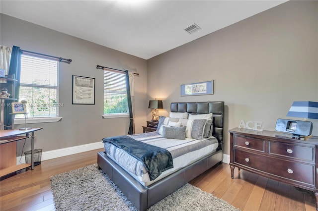 bedroom featuring light hardwood / wood-style flooring