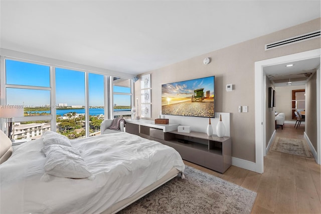 bedroom featuring light hardwood / wood-style floors