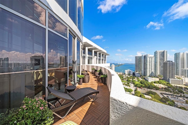 balcony featuring a water view