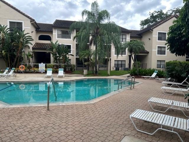 view of pool with a patio