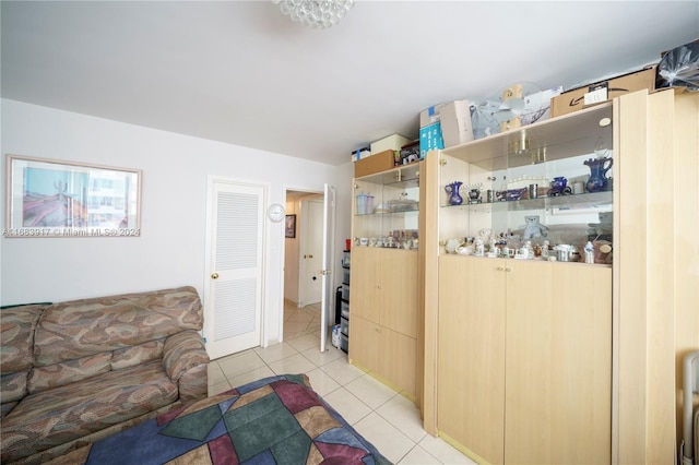 interior space featuring light brown cabinets and light tile patterned floors