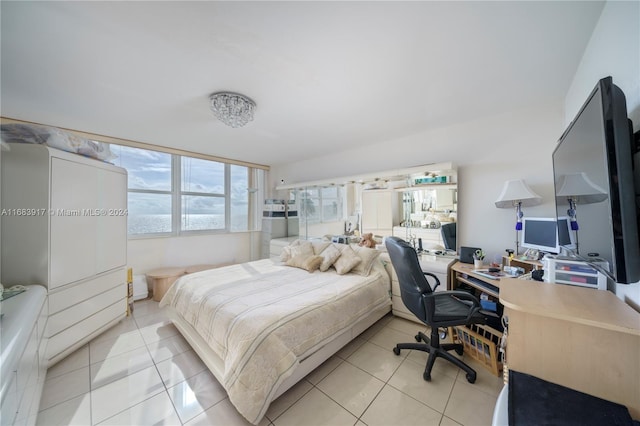 bedroom with light tile patterned flooring