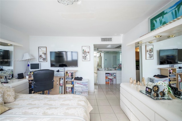 bedroom featuring light tile patterned floors