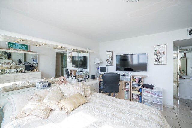 bedroom featuring tile patterned floors